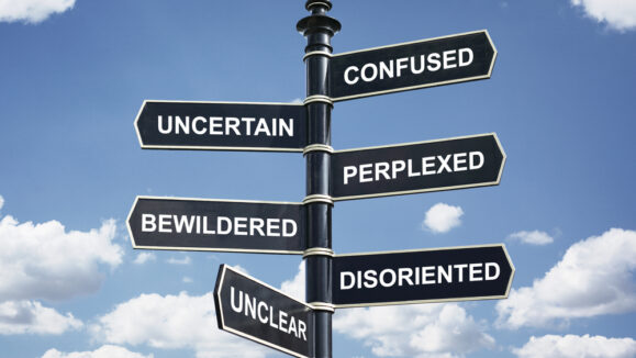 Crossroad,Signpost,Saying,Confused,,Uncertain,,Perplexed,,Bewildered,,Disoriented,,Unclear,Concept