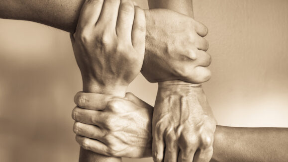 Hands,United,Helping,Each,Other.,In,Unity,There,Is,Strength